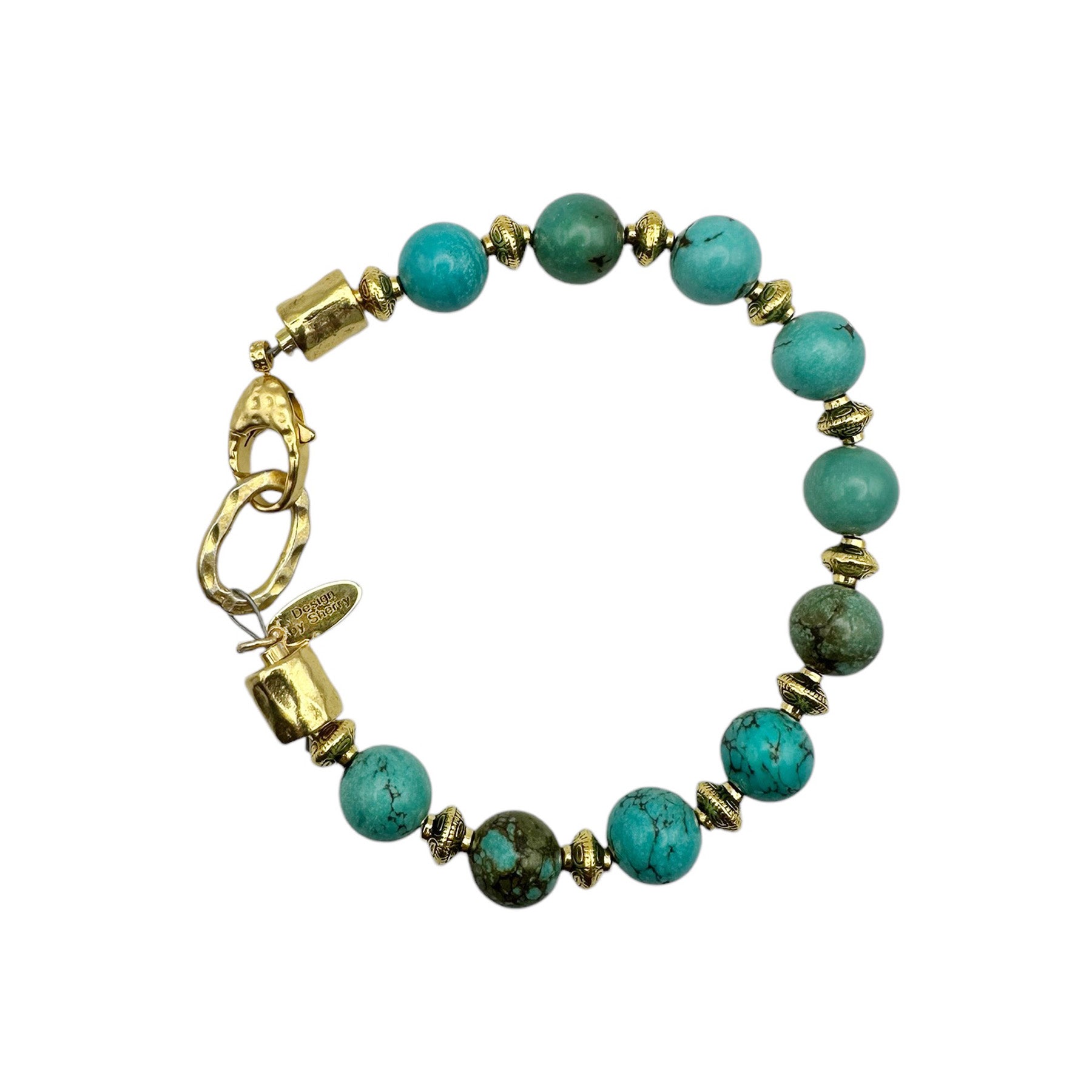 TURQUOISE BRACELET WITH 12 K GOLD